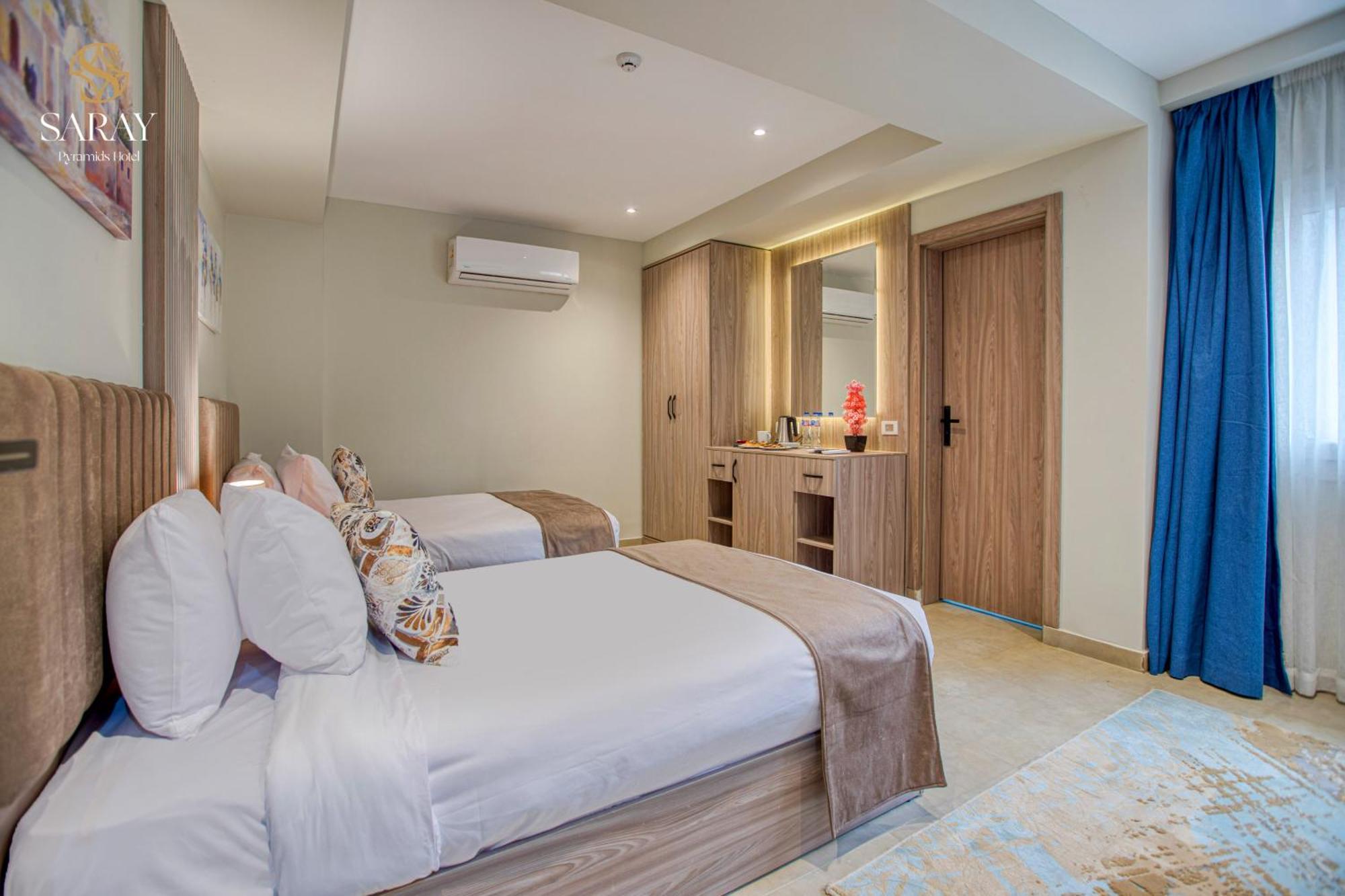 Saray Pyramids & Museum View Hotel Kafret el-Gabal Quarto foto